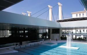 immediate Visitors, who enter at the highest level of the public seating, are met with a view of the sporting pool below with the leisure pool to its