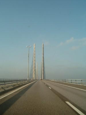 the Danish side The fixed link across Øresund comprises a 4 km immersed tunnel, the artificial island, Peberholm, which is 4 km long, and an 8 km cable-stayed bridge with a main span of 490 m The
