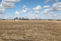 3 +/- acres ditches/waste; Legal: A tract in 32, T8N, R52W; Location: Across Hwy #14 from Wal-Mart; Level terrain; Primarily class III