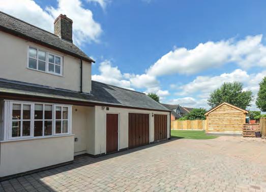 This has direct access to a double garage with workshop and storage and also houses the boiler for the hot water heater and first floor central heating.