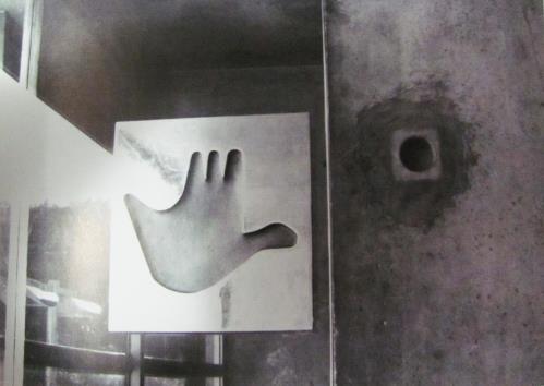 My hand is received by the handle; it is mirrored by its forms, like holding Figure 8: Door at Maison des Jeunes, 1965.. hands with another person.
