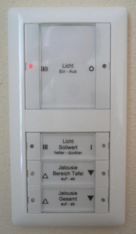 standard classroom control system light switch; location: next to entrance.
