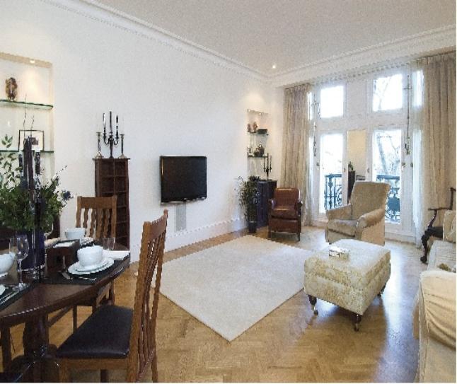Flat 123b, 4 Whitehall Court, London SW1 An immaculate interior designed two bedroom apartment with high ceilings and balconies overlooking the river