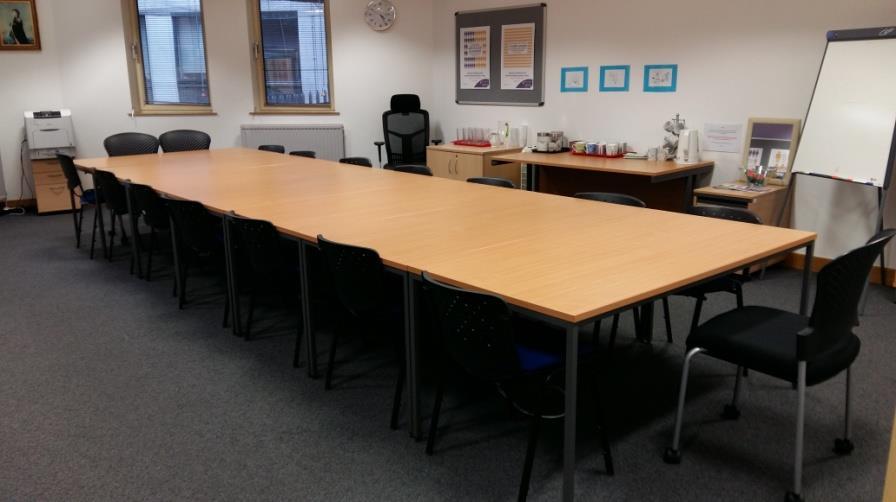 Currently set up for 17 people boardroom style (18 max).