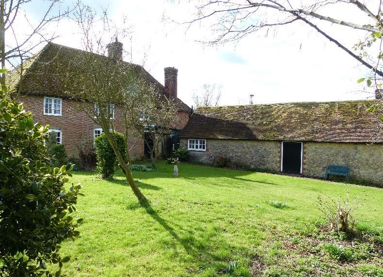 A traditional Grade II Listed Wealden farmhouse now requiring updating and improvement together with a detached single storey one bedroom annexe and a detached oak framed barn, garden and paddocks