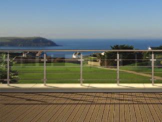 Apartments - 201* / 210 (sleeps 6) From its commanding position on the second floor this large three bedroom apartment enjoys unheralded views over the Greenaway and out to sea.