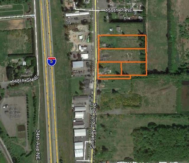 Flat building site in a fully developed area across from school and adjacent to Interurban Trail. Profitable business also available.