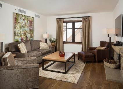 From both the bedroom and living room, enjoy relaxing by your stone-framed fireplace, with the entertainment of watching skiers cruise down the runs off of the Village Express.