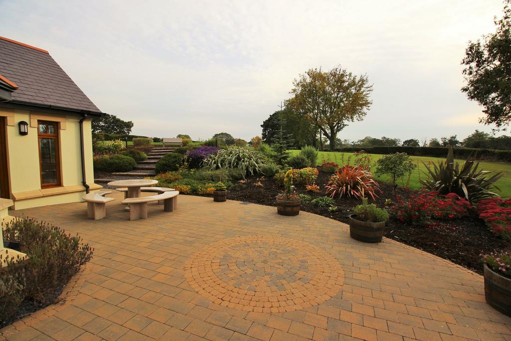 Gardens: Beautifully landscaped gardens extending to approximately 2 acres and laid out extensively in neatly manicured