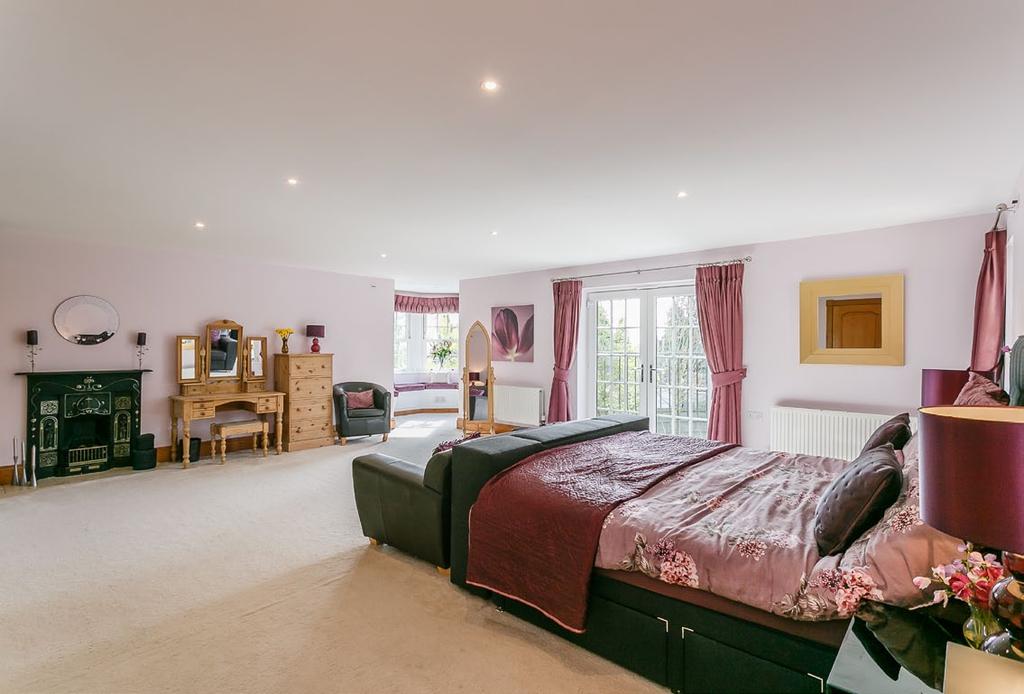 Two further double bedrooms and bathroom together with a large games room which overlooks the front elevation.