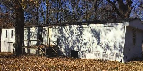 Metal Roof Approximately 3 Years Old In A Well Established Neighborhood -- $175,000 Call Shari Kim Dudley MLS#118102 4BR/ 3BA PERMANENT BRICK