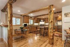Featuring hardwood floors & custom log