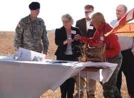 Officials gather in Flint Hills to sign easement By Lynn Byczynski On an unseasonably warm November morning, more than 100 people gathered on a ridgetop high in the Flint Hills to celebrate the