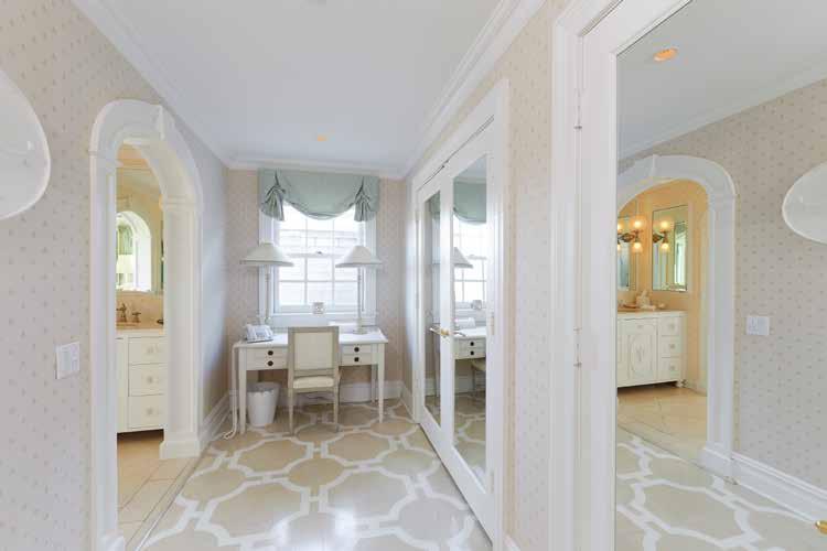 The master bathroom features a dressing room with