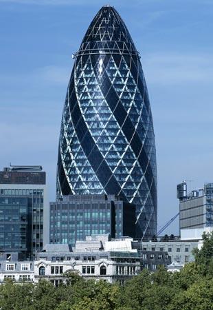 Nicknamed the Gherkin for its unique round, tapered shape, the office tower at 30 St Mary Axe in London s financial district opened in 2004.