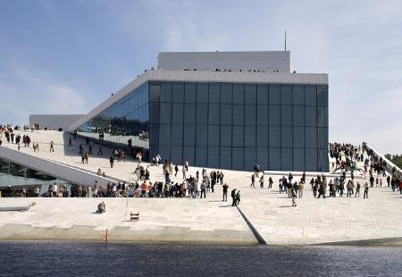 The Oslo Opera House in Norway, opened in 2008, appears to emerge out of the neighboring Oslofjord like an iceberg.