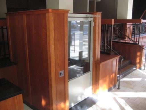 Handicap accessible interior with existing automatic wheelchair lift and two elevators Range Hoods