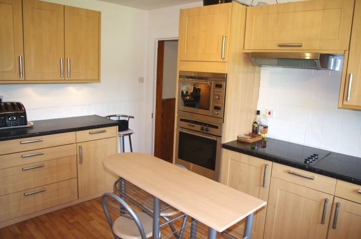 Kitchen measuring 3.27m x 4.11m or thereby. The fully fitted Kitchen has windows to the garden and fine views. There is a wide display ledge.