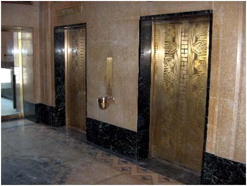 Photo #29: Elevator doors, main entrance lobby.