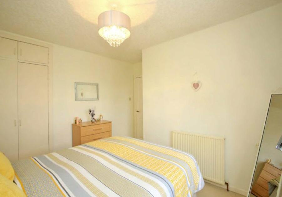 90m) Further Double Bedroom with window overlooking the rear of the property.