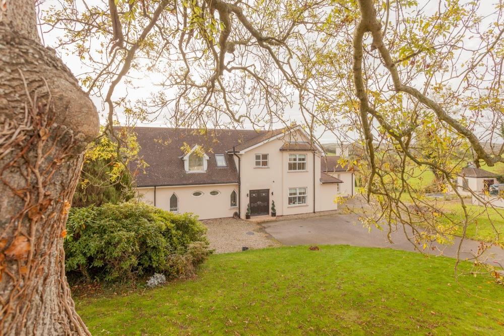 com For Sale - 19 Lisboy Road, Downpatrick, BT30 7LE Offers Around 485,000 Features Extended and refurbished detached property situated on an elevated site with stunning rural views The internal