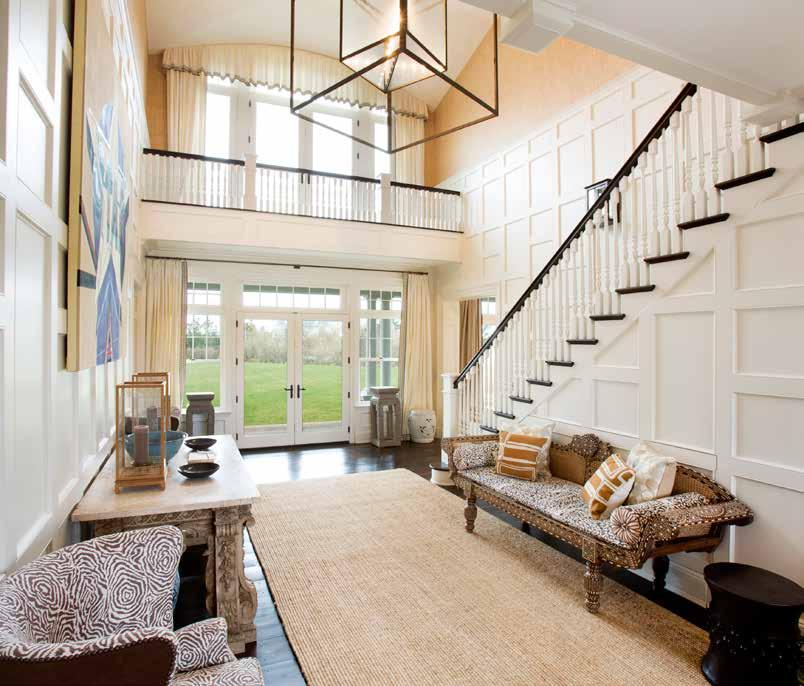 Double Height Paneled Entry Foyer - Powder Room - Formal Living Room with Fireplace - Study/Office with: - Wet Bar - Fireplace - Formal Dining Room with Glass Wine Closet - Central Air Conditioning -