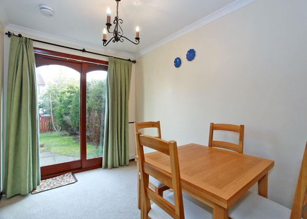 Light fitment, fitted blinds and curtains, fitted carpet, under stair storage cupboard, door to