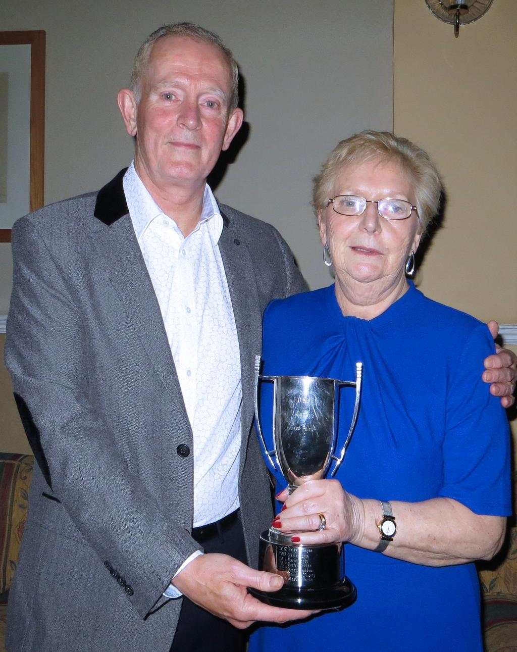 COLLINS BRIDGE CLUB S PLAYER OF THE YEAR Brig Gen Patrick Flynn, GOC First Brigade and President of Collins Bridge Club, presents the Player of the Year award to Mrs Marie Whyte.