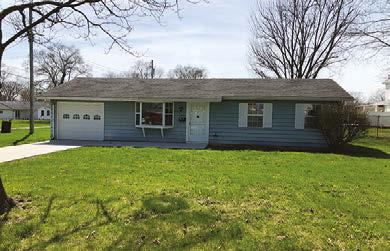 5 bath house sitting on two lots totaling 1.35 acres, located close to schools and the Trojan complex.
