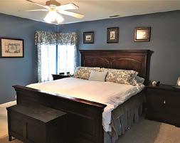 Master bedroom on first floor. Another 1/2 bath on main floor. Upstairs sit at the large windows and enjoy the view.
