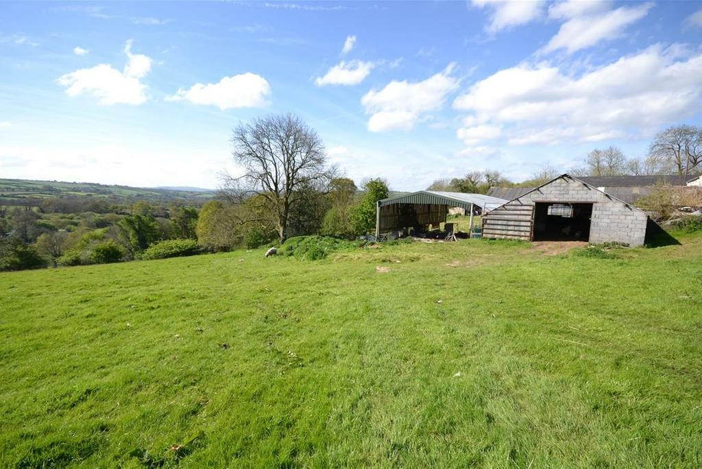 MORE OUTBUILDINGS LAND The property sits in just over 26.68 acres in all with a holding paddock below the outbuildings and a larger paddocks and fields to the side and below the main farmhouse.