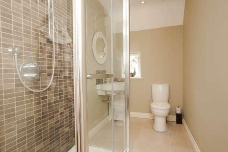 shower. Low flush WC. Wash hand basin. Ceramic tiled floor. LANDING: Airing cupboard.