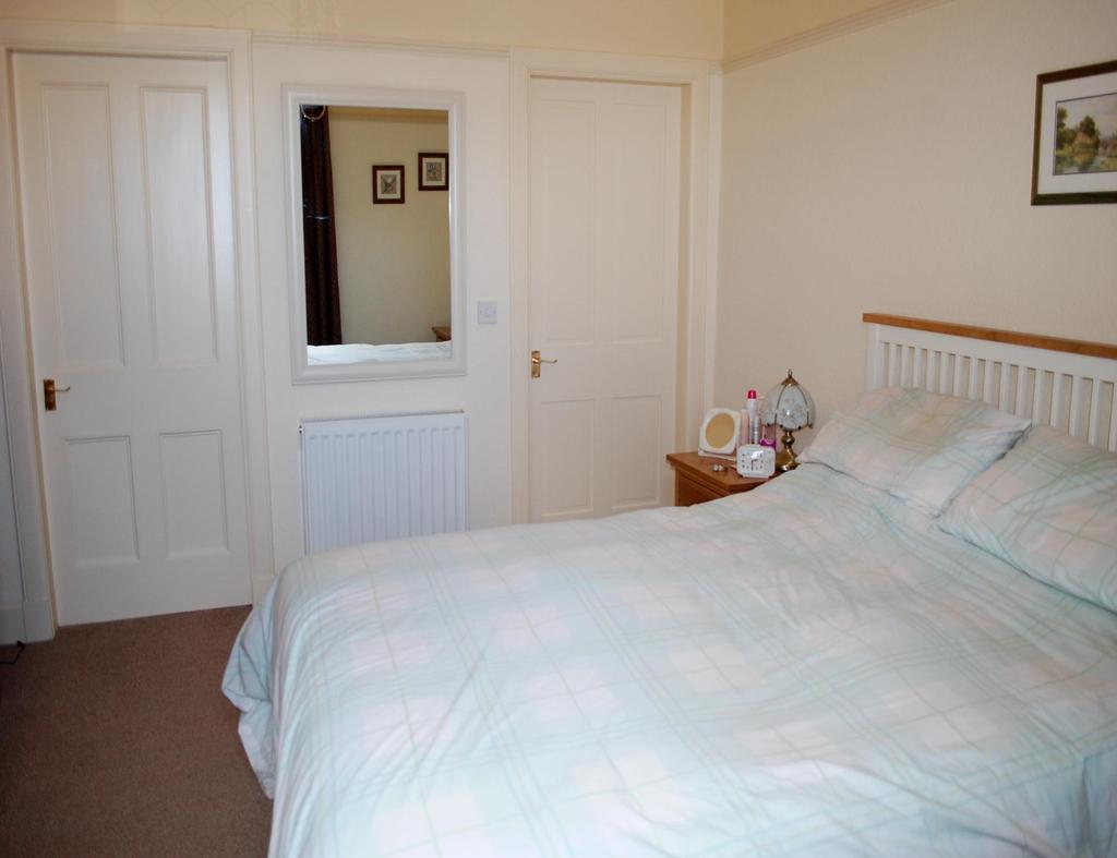 Ground floor master bedroom with en-suite: 12 05 x 11 06 A generous double bedroom located downstairs, a window looks to the front and allows plenty of natural light into the