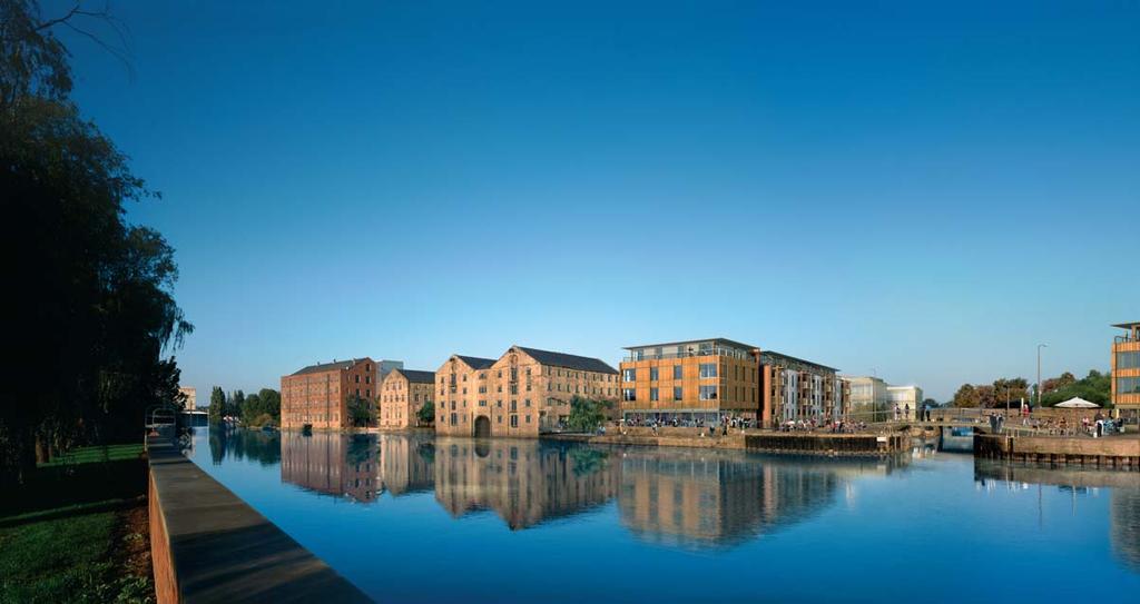 View of Waterfront Wakefield looking north east from across the River Calder towards Hebble Wharf and Navigation Warehouse Full height atrium New vertical circulation core