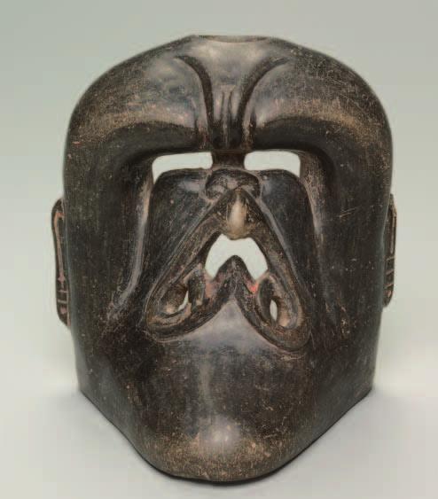 Vessel with Deity Mask. Central Mexico, Olmec style; 1200 900 BC; darkware ceramic, traces of pigment; 17.9 x 16.5 x 15.3 cm; Purchase from the J. H. Wade Fund 2002.67 Female Worshiper.