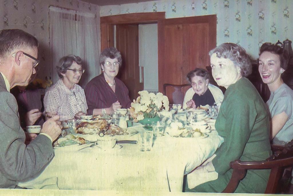 Dinner in the Log Cabin Dinner at the Brown home before an Ellicott City Elementary School PTA meeting fall 1959. Guinea hen raised by the family was served for dinner.