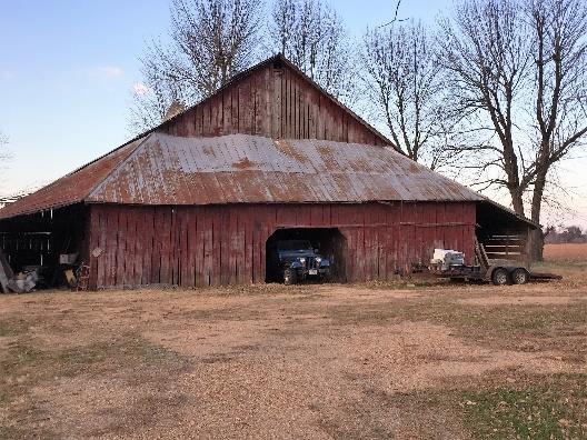 6 acres with a home and barn.