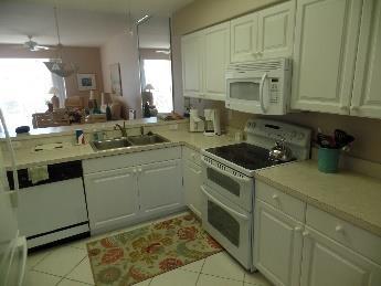 Fully furnished kitchen, lanais, and laundry.