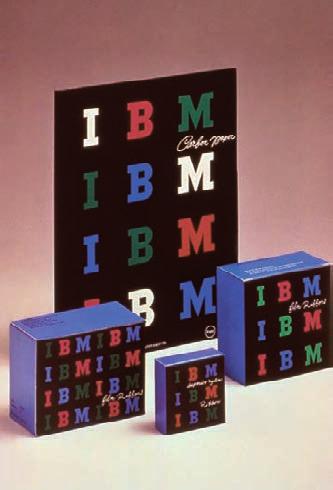 A strong corporate identification was achieved through a repeating pattern of blue, green, and magenta capital letters on black package fronts, white handwritten product names, and blue package tops
