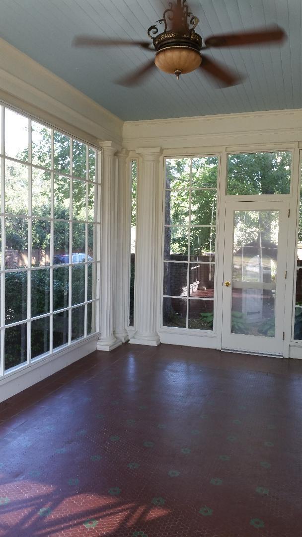 Sunroom 1 access from Living Room, also has backdoor to access garden courtyard.