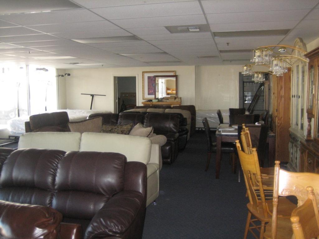 1. Photo of the furniture store business inside the existing building on-site.