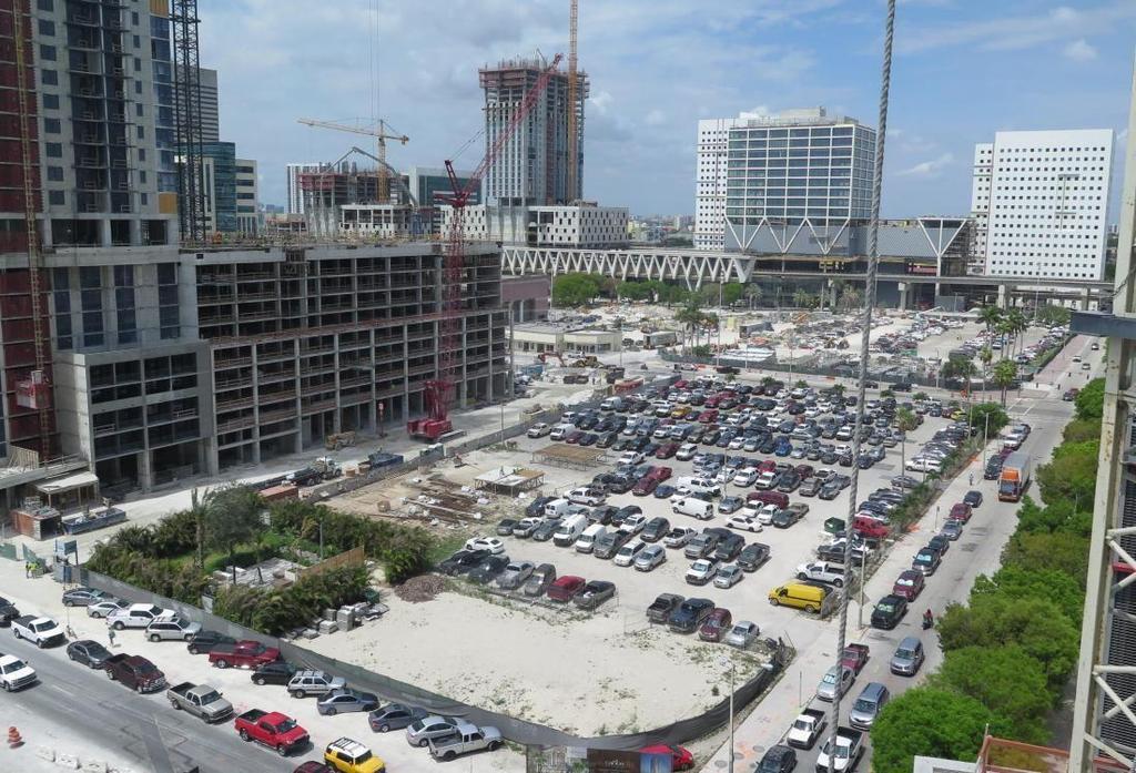 To the left, Caoba, an apartment building that is part of Miami Worldcenter. The zigzag platform is part of Miami Central station, where Brightline rail service is set to begin May 19.