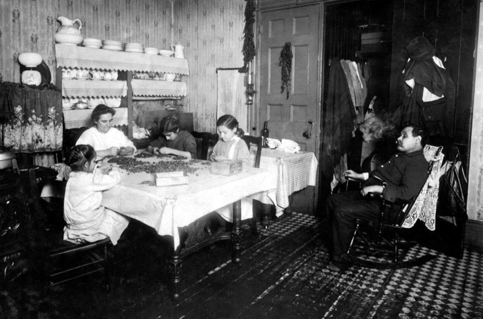 original cigar maker; Men, women and children work together seven days in the week