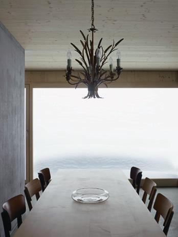 Opposite The dining table is a bespoke design by the