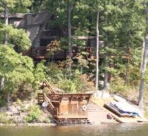 s plenty of room for entertaining. Wraparound deck and lakeside dock!