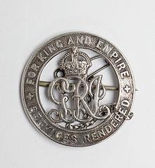 The large sterling silver lapel badge was intended to be worn on civilian clothes.