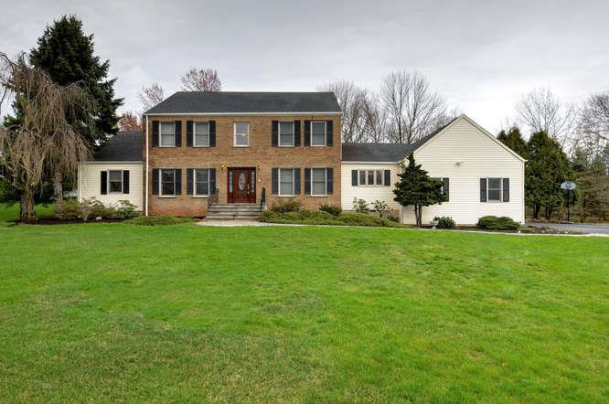 Price Upon Request 4BR, 4.1 Baths, Two Car Garage Center Hall Colonial, 1.