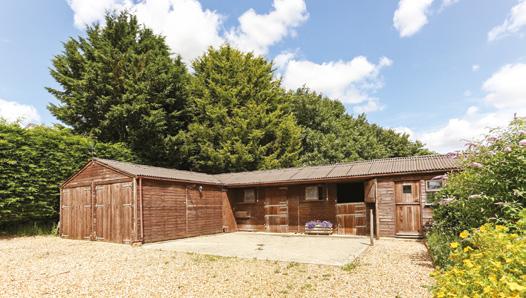 Located behind the house is the stable block, with 2 loose boxes, workshop and double garage. There is also a good sized office adjoining.