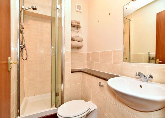 SHOWER ROOM: 7 x 4 8 approx. Centrally located, the Shower Room is fitted with a shower enclosure, w.c and wash hand basin.