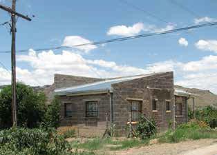 burning, Maseru East FIGURE 82 Cement block housing by MLGCPA FIGURE 80 Local burnt brick